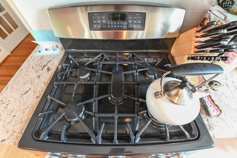 Cozy Charm: Traditional White Kitchen with Island & Appliance Package
