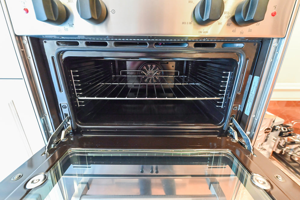 Wood-Mode Wonder: Traditional Light Cream Kitchen with Granite Countertops