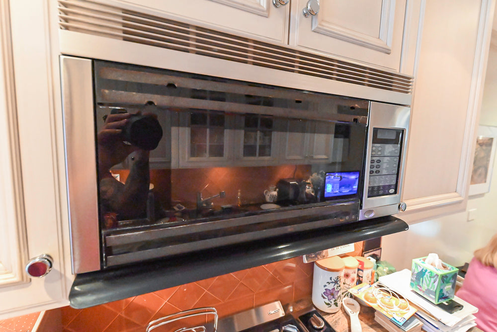Wood-Mode Wonder: Traditional Light Cream Kitchen with Granite Countertops