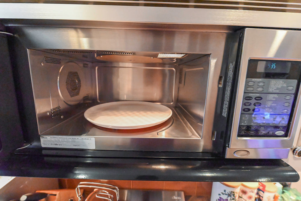 Wood-Mode Wonder: Traditional Light Cream Kitchen with Granite Countertops