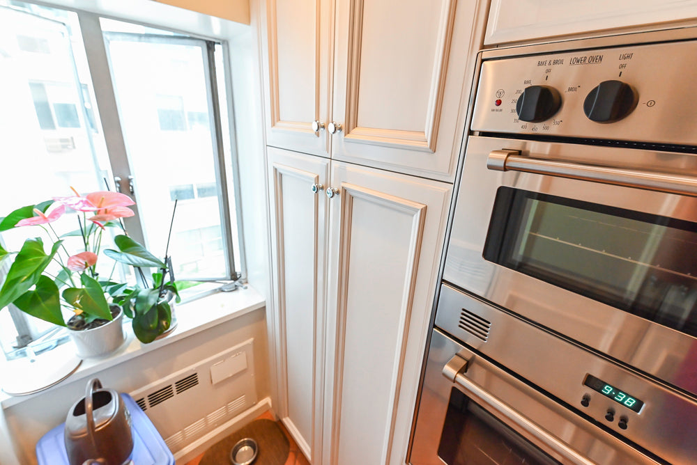 Wood-Mode Wonder: Traditional Light Cream Kitchen with Granite Countertops