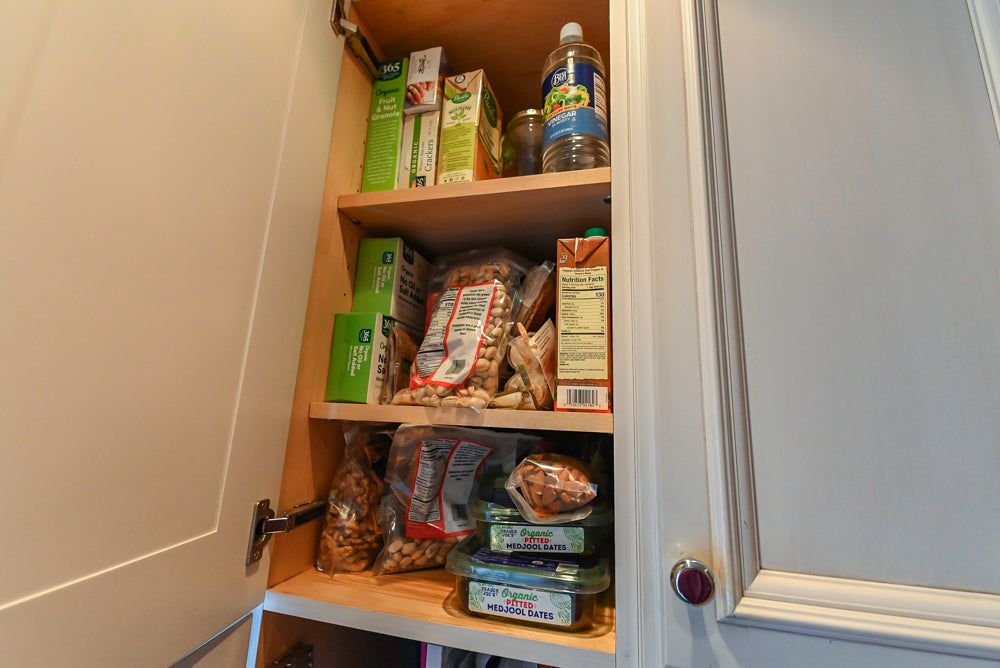 Wood-Mode Wonder: Traditional Light Cream Kitchen with Granite Countertops
