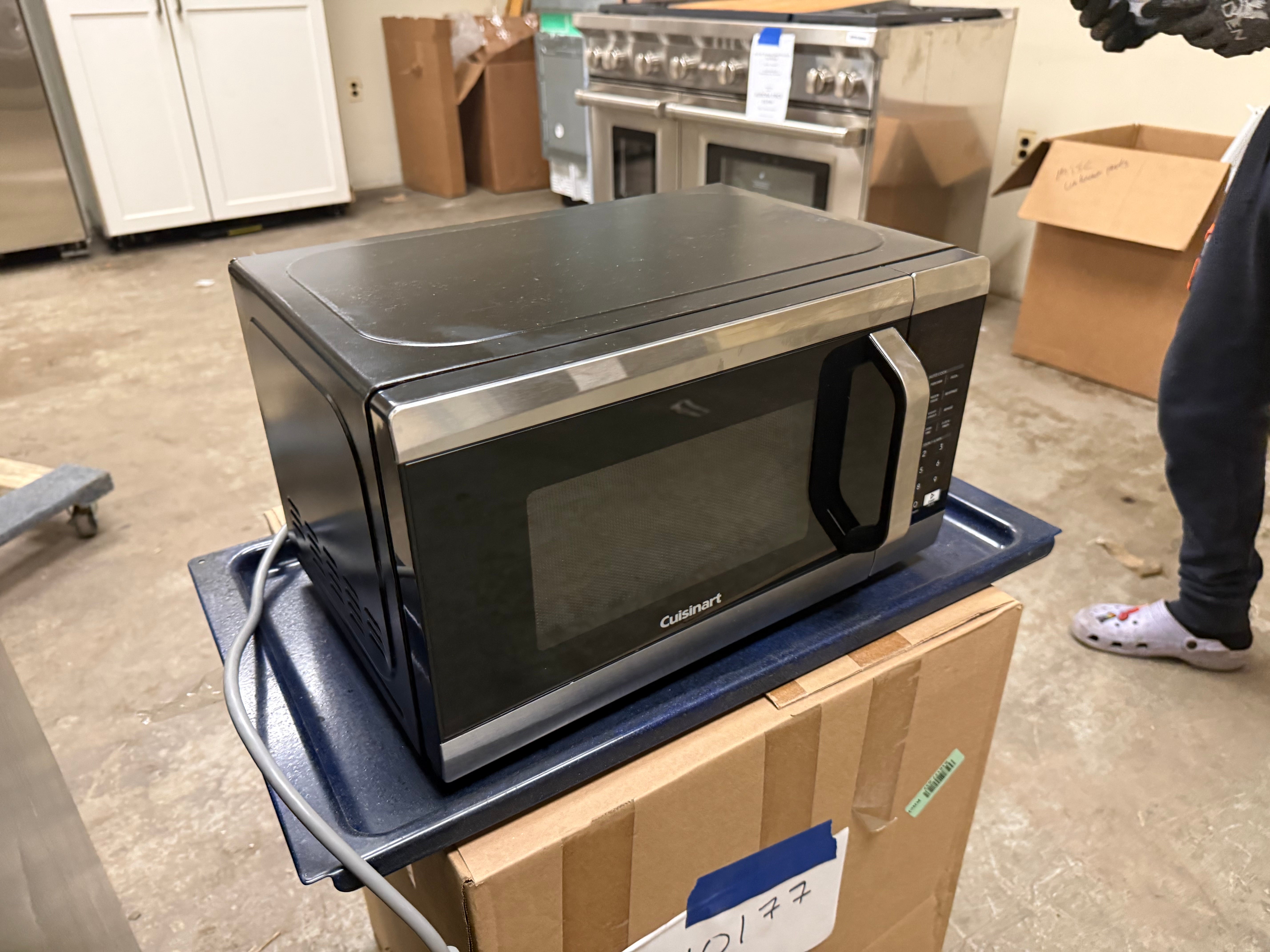 Small stainless steel microwave for apartments featuring 8 auto-cook presets