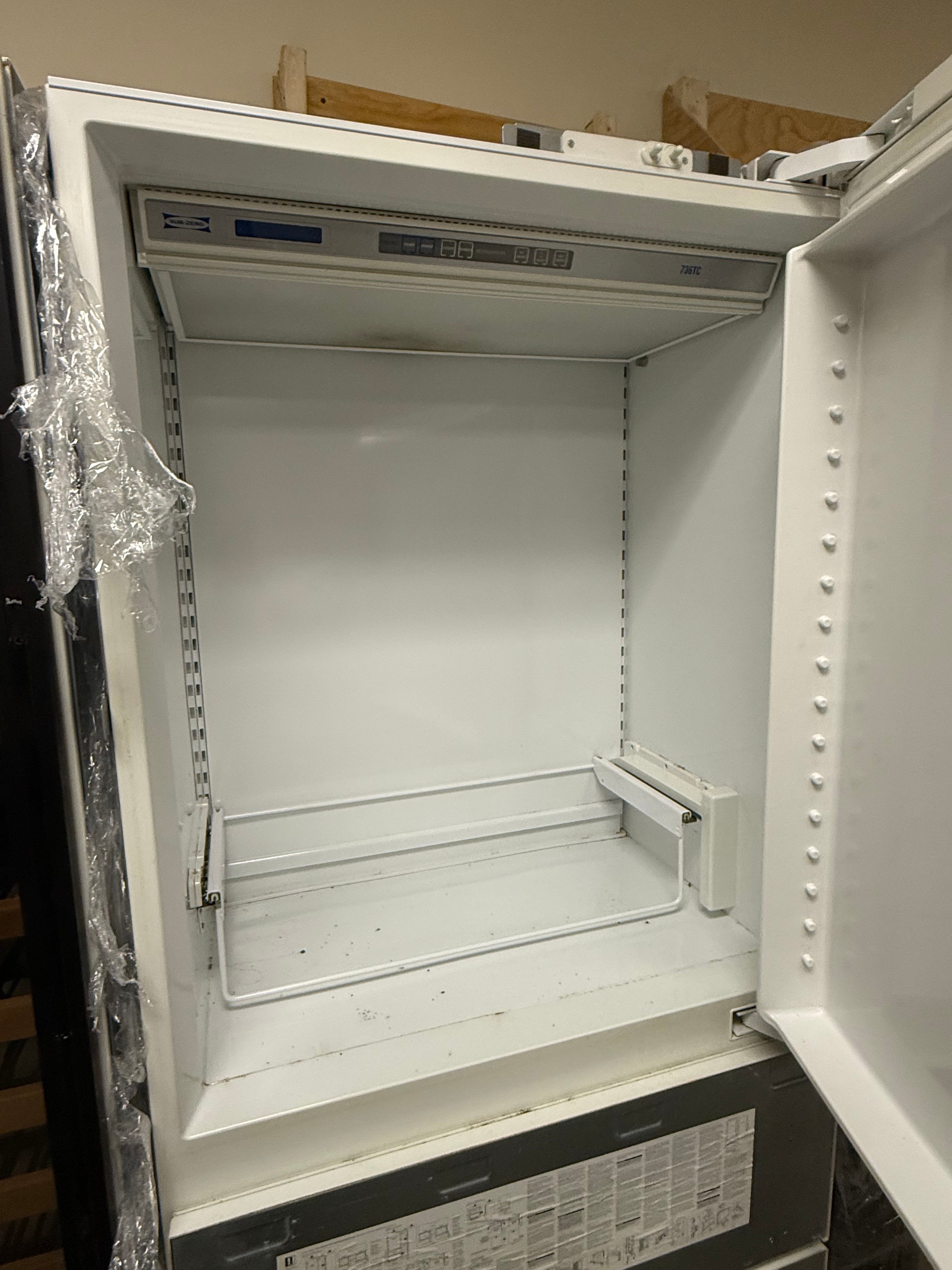 Integrated Sub-Zero 736TCI unit with double freezer drawers and ice maker