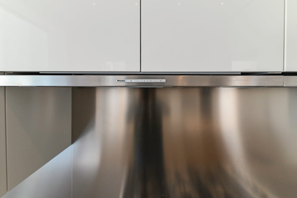 Modern Glossy White Kitchen with Island, Marble Countertops & Miele Appliances