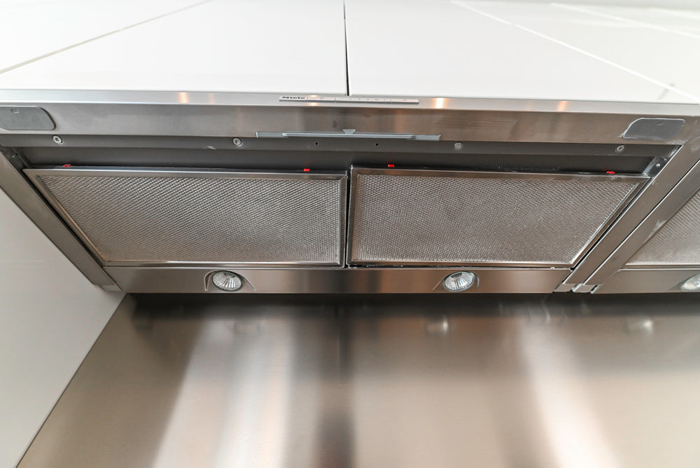 Modern Glossy White Kitchen with Island, Marble Countertops & Miele Appliances