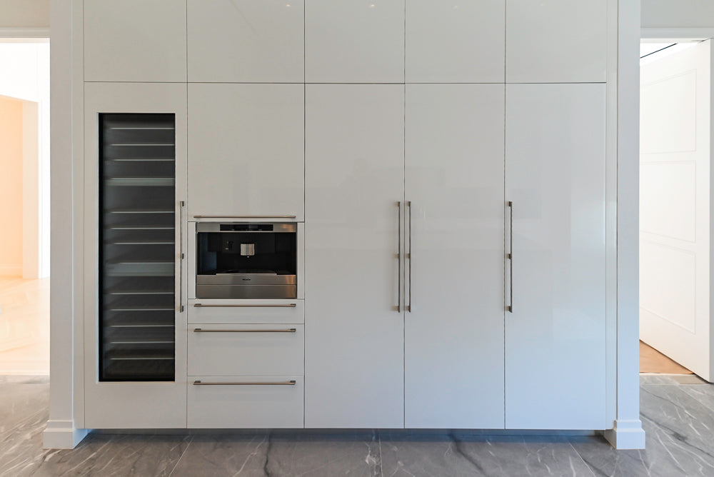 Modern Glossy White Kitchen with Island, Marble Countertops & Miele Appliances