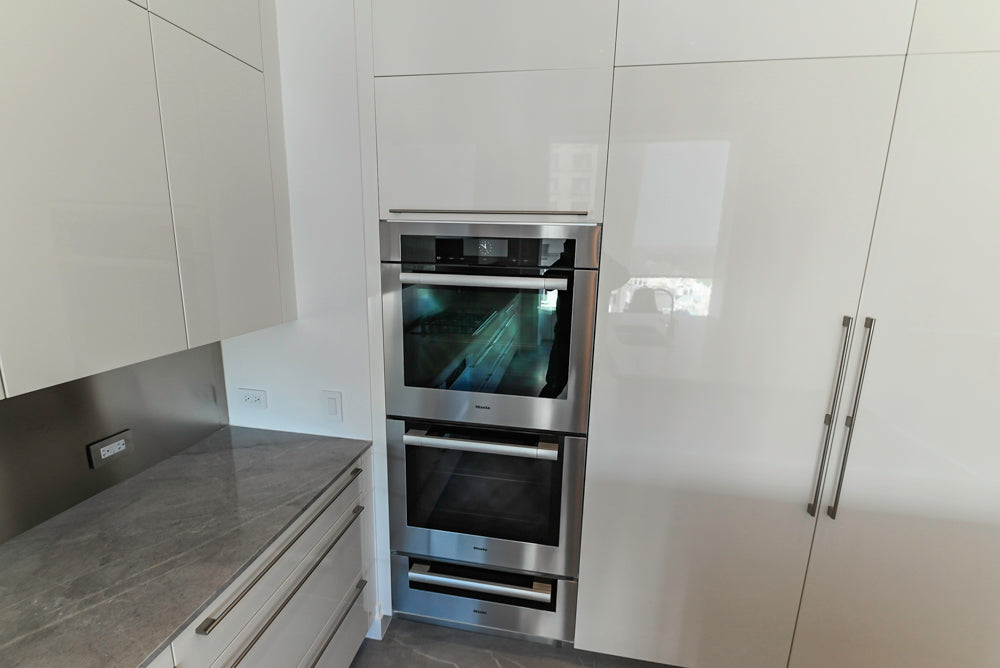 Aran Cucine Modern Glossy White Kitchen with Island, Marble Countertops & Miele Appliances