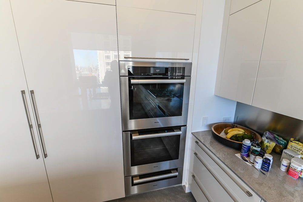 Aran Cucine Modern Glossy White Kitchen with Island, Marble Countertops & Miele Appliances