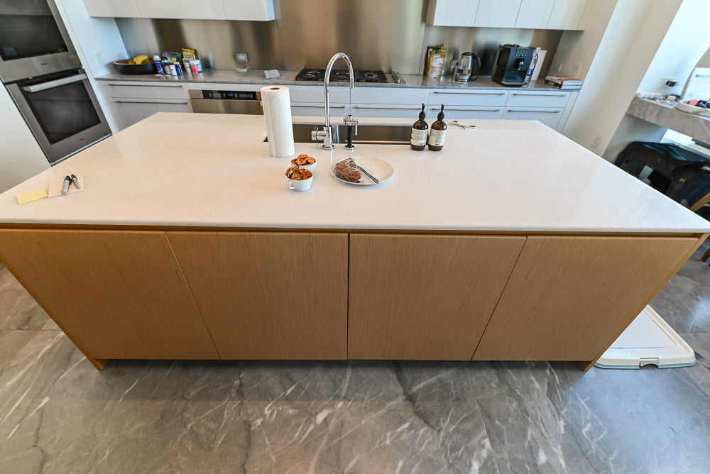Modern Glossy White Kitchen with Island, Marble Countertops & Miele Appliances