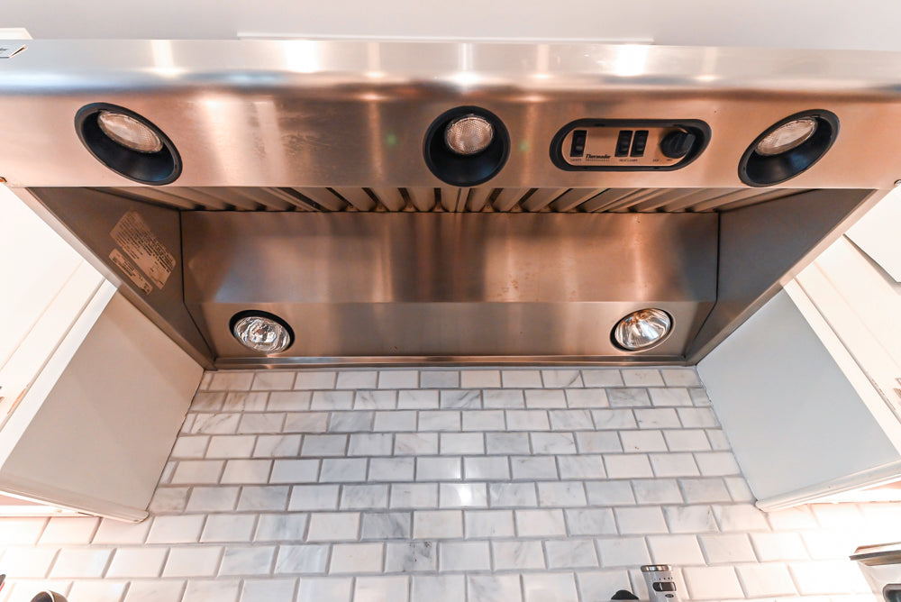 Craft-Maid Custom Cabinetry Traditional White Kitchen with Grey Island and Appliances