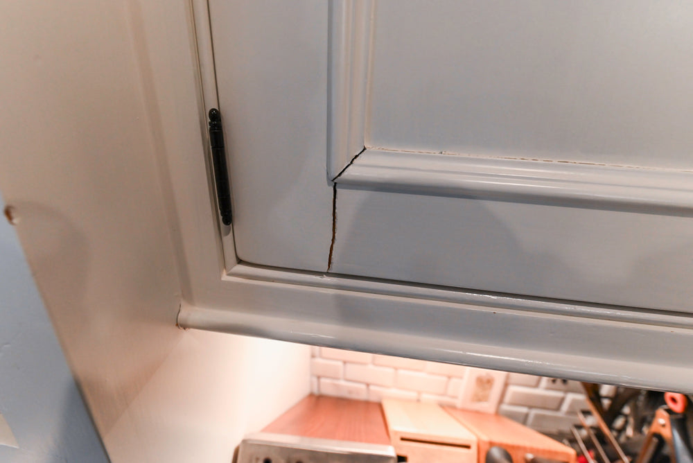 Craft-Maid Custom Cabinetry Traditional White Kitchen with Grey Island and Appliances