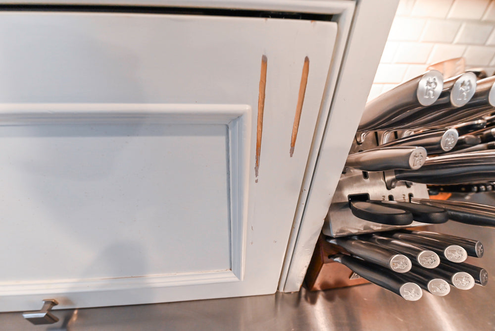 Craft-Maid Custom Cabinetry Traditional White Kitchen with Grey Island and Appliances