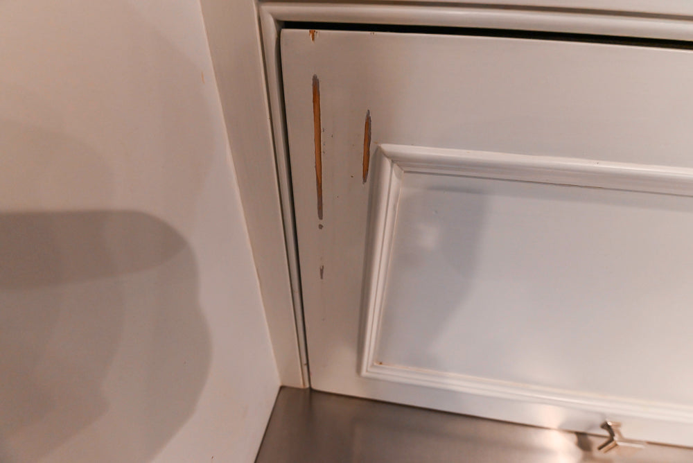 Craft-Maid Custom Cabinetry Traditional White Kitchen with Grey Island and Appliances