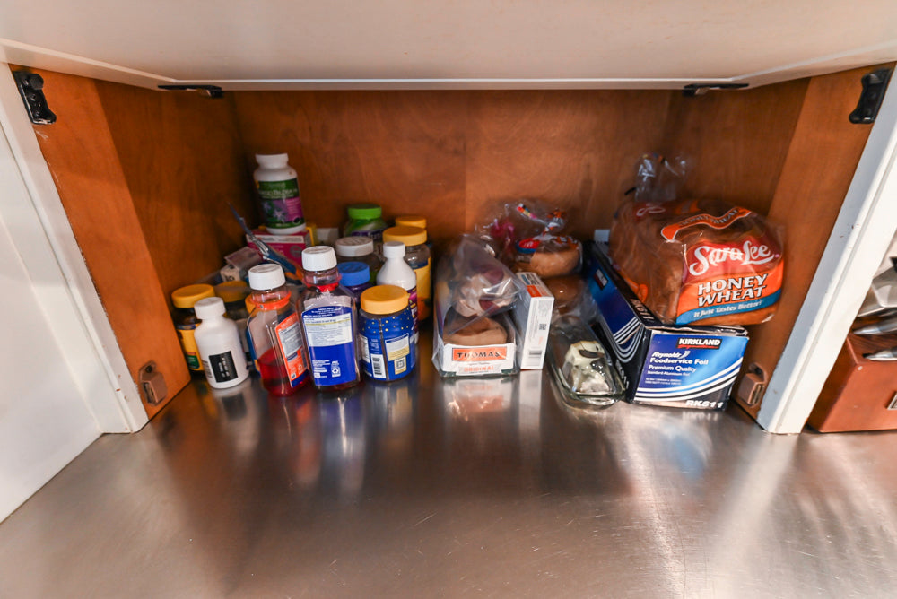 Craft-Maid Custom Cabinetry Traditional White Kitchen with Grey Island and Appliances