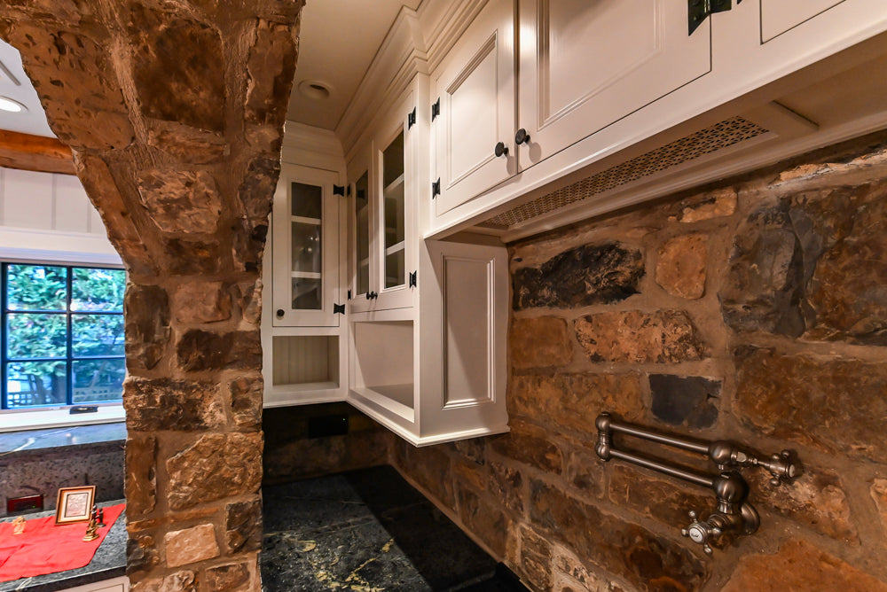 Rustic Traditional White & Navy Kitchen with Black AGA Range, Wood Top Island & Soapstone Countertops