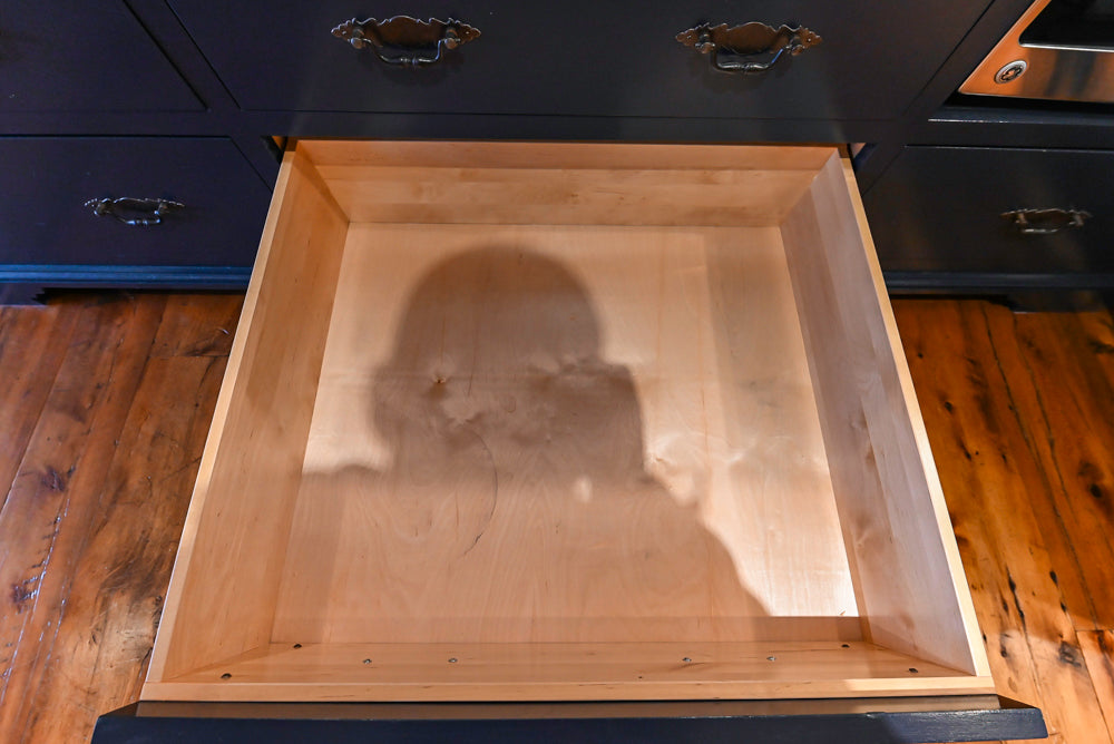 Rustic Traditional White & Navy Kitchen with Black AGA Range, Wood Top Island & Soapstone Countertops