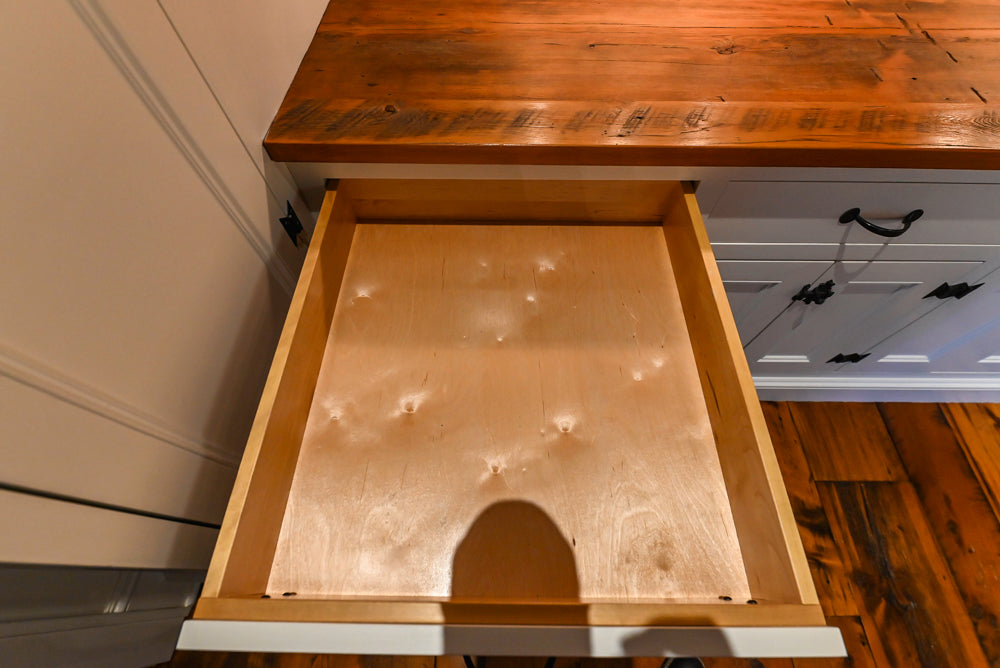 Rustic Traditional White & Navy Kitchen with Black AGA Range, Wood Top Island & Soapstone Countertops