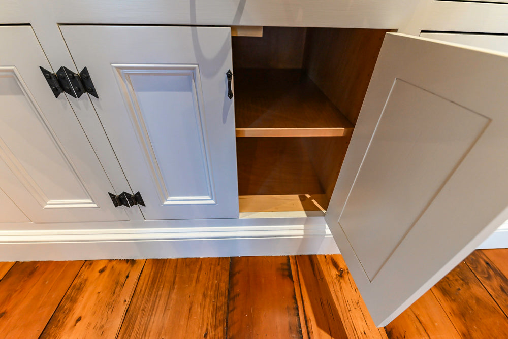 Rustic Traditional White & Navy Kitchen with Black AGA Range, Wood Top Island & Soapstone Countertops