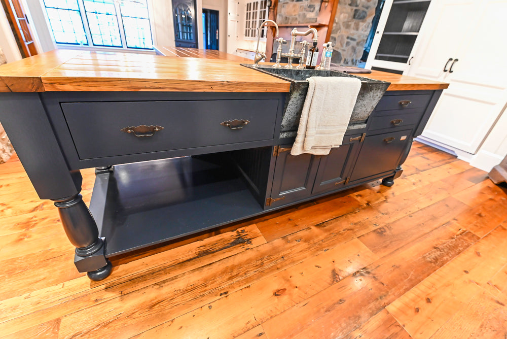 Rustic Traditional White & Navy Kitchen with Black AGA Range, Wood Top Island & Soapstone Countertops