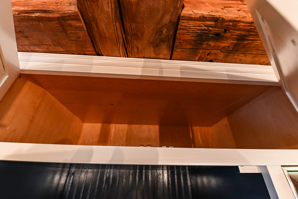 Rustic Traditional White & Navy Kitchen with Black AGA Range, Wood Top Island & Soapstone Countertops