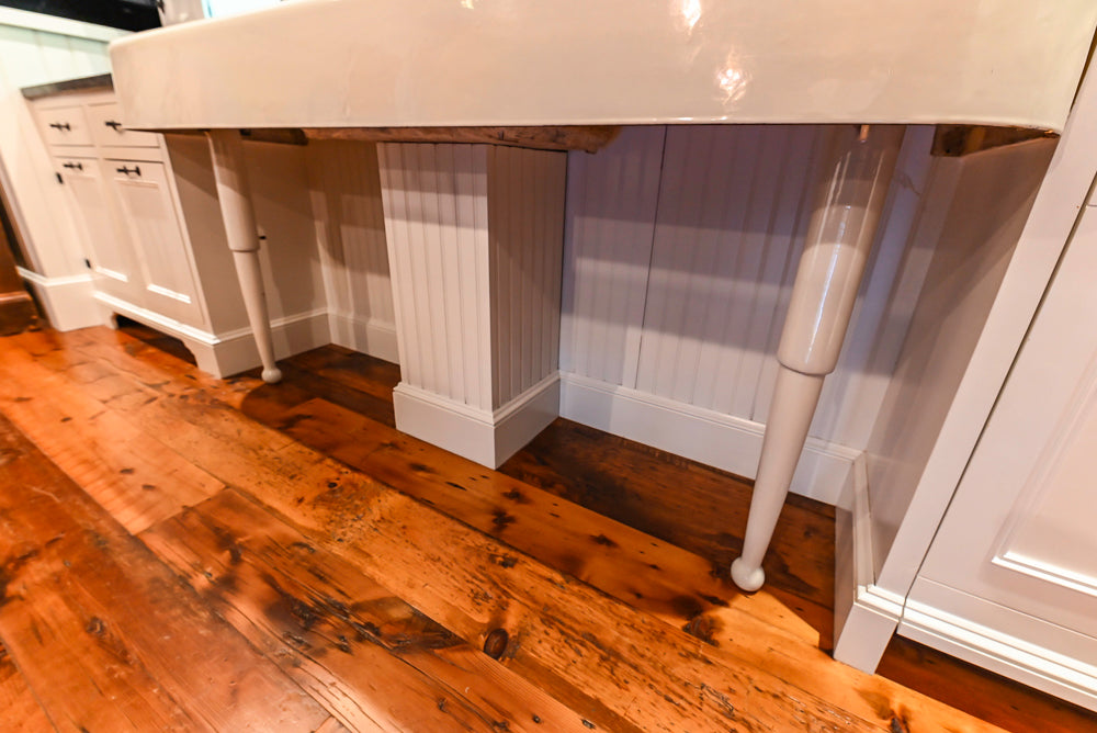 Rustic Traditional White & Navy Kitchen with Black AGA Range, Wood Top Island & Soapstone Countertops