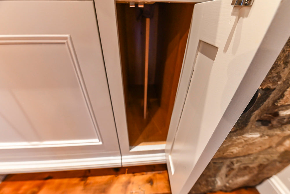 Rustic Traditional White & Navy Kitchen with Black AGA Range, Wood Top Island & Soapstone Countertops