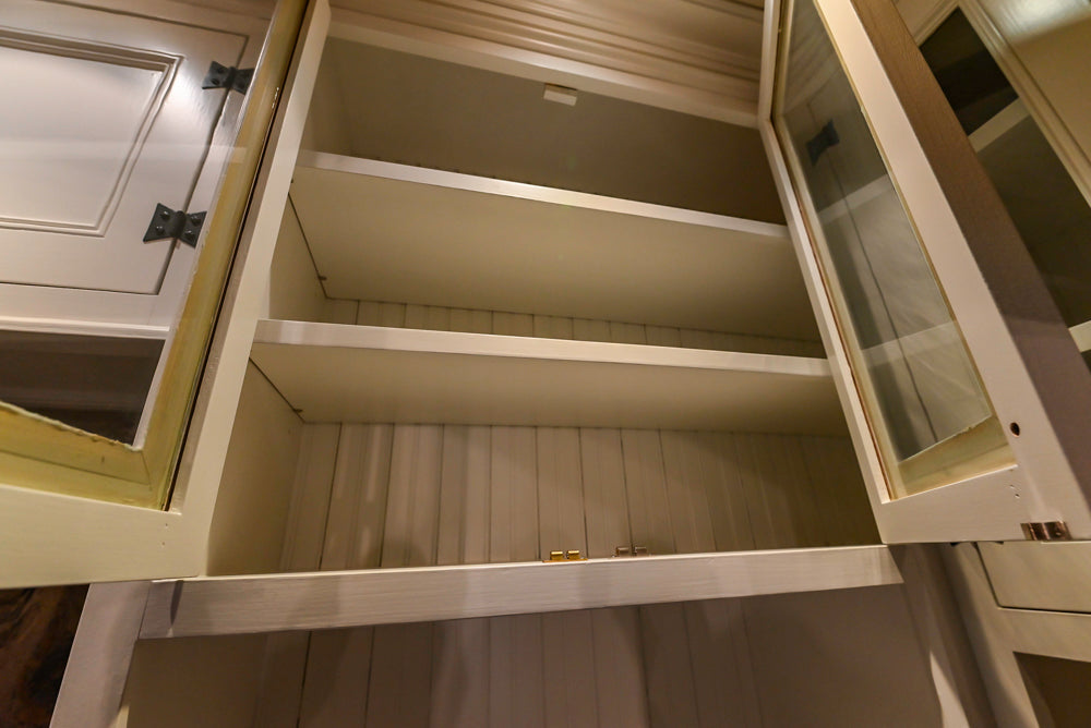 Rustic Traditional White & Navy Kitchen with Black AGA Range, Wood Top Island & Soapstone Countertops