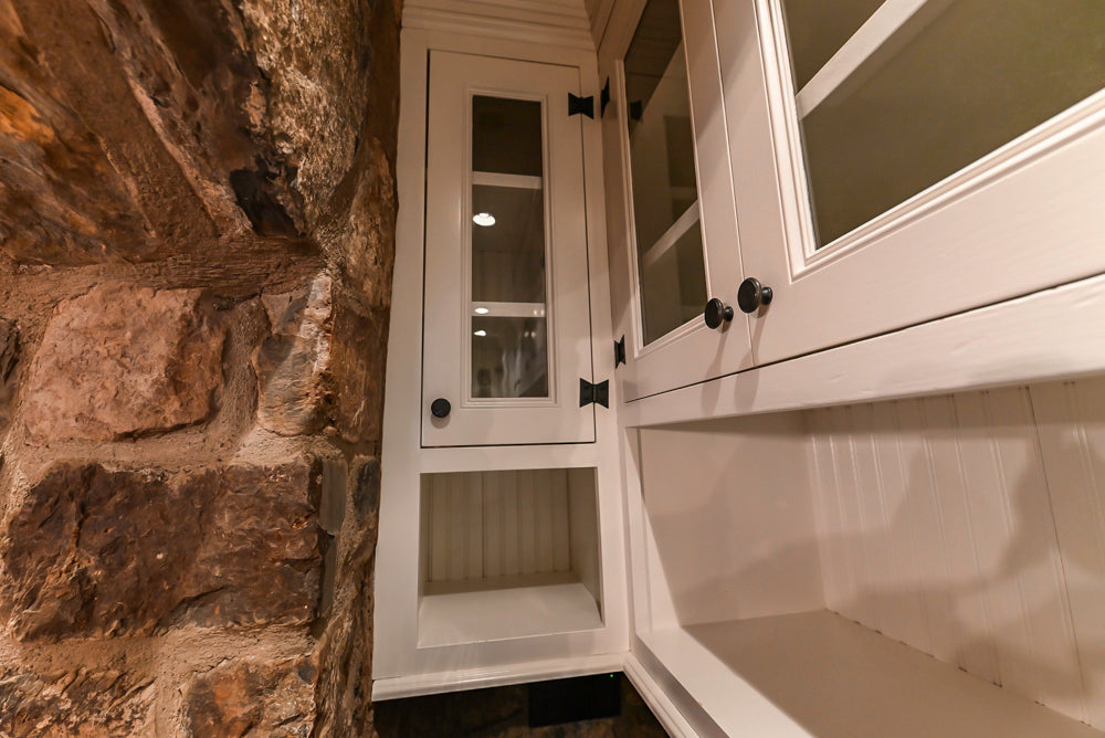 Rustic Traditional White & Navy Kitchen with Black AGA Range, Wood Top Island & Soapstone Countertops