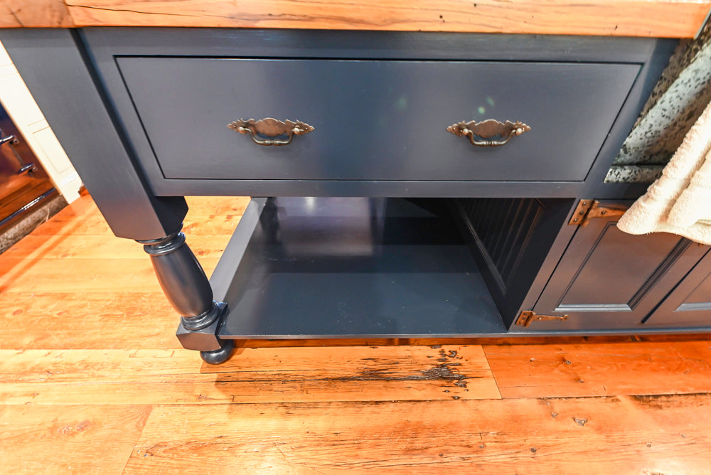Rustic Traditional White & Navy Kitchen with Black AGA Range, Wood Top Island & Soapstone Countertops