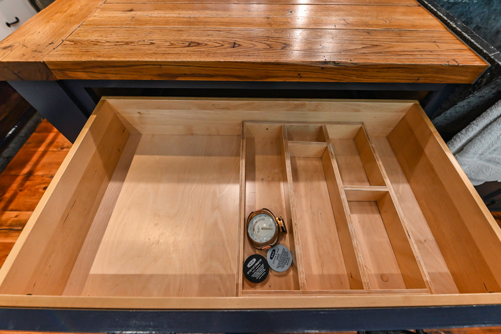 Rustic Traditional White & Navy Kitchen with Black AGA Range, Wood Top Island & Soapstone Countertops