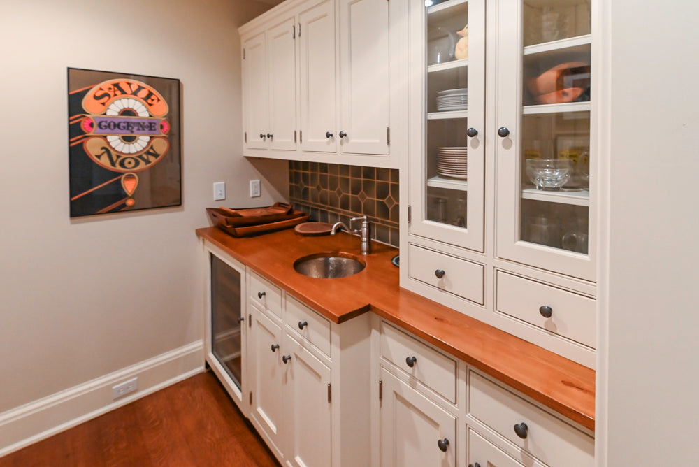 Traditional White Butler's Pantry with Prep Sink and Wood Countertops