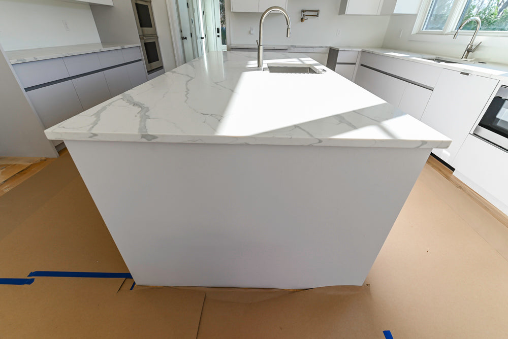 Large White Modern Kitchen with Island and Quartz Countertops
