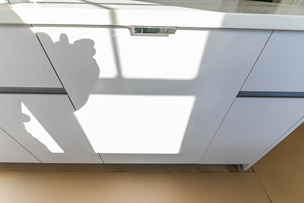 Large White Modern Kitchen with Island and Quartz Countertops