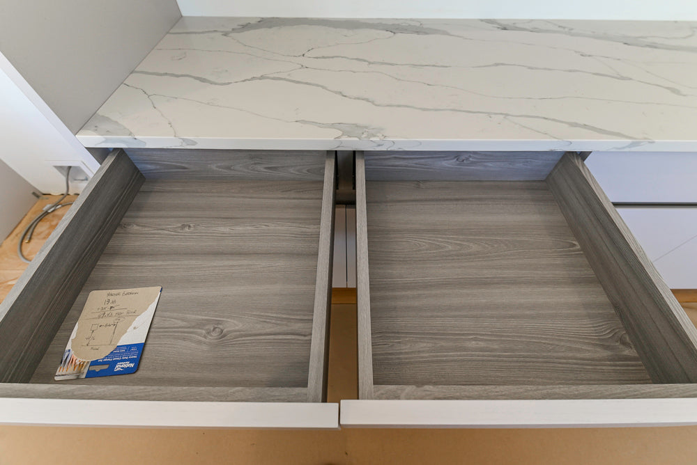 Large White Modern Kitchen with Island and Quartz Countertops