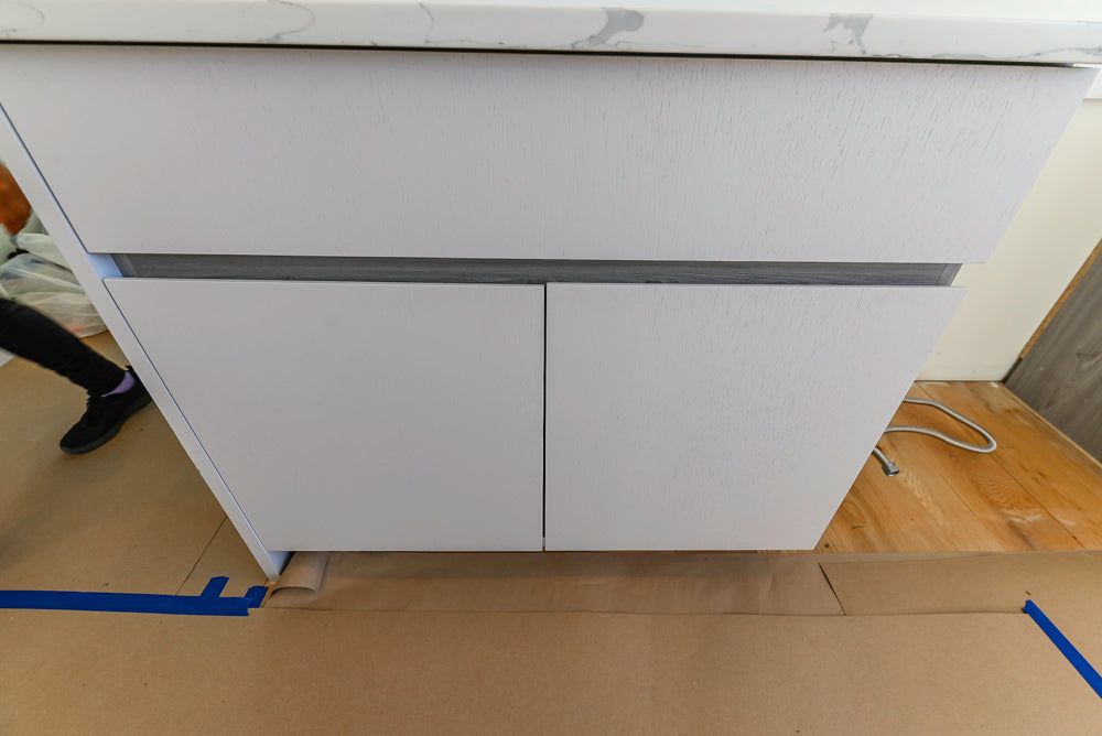 Large White Modern Kitchen with Island and Quartz Countertops