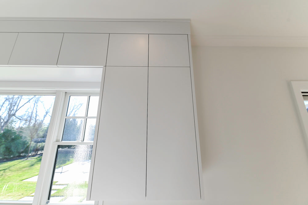 Large White Modern Kitchen with Island and Quartz Countertops