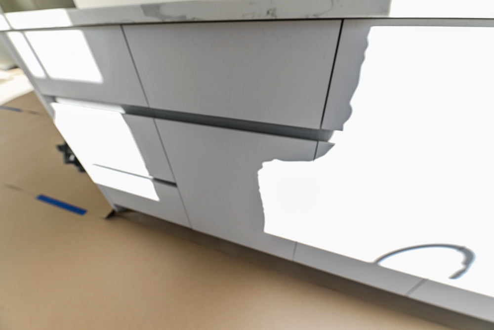 Large White Modern Kitchen with Island and Quartz Countertops