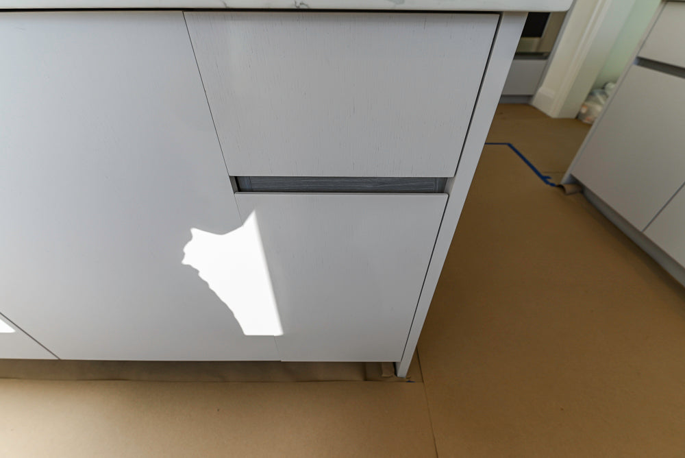 Large White Modern Kitchen with Island and Quartz Countertops