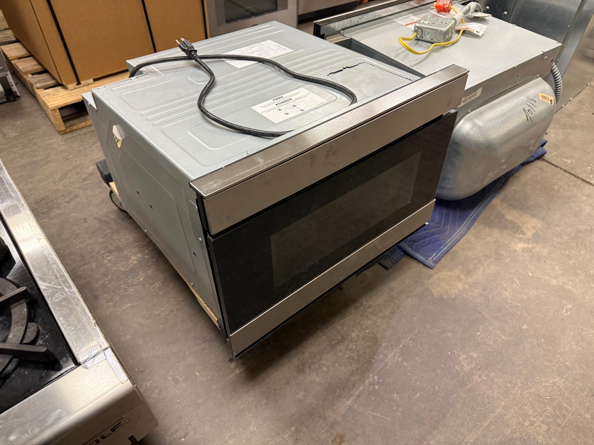 Close up of Sharp Easy Wave Open touchless sensor on microwave drawer