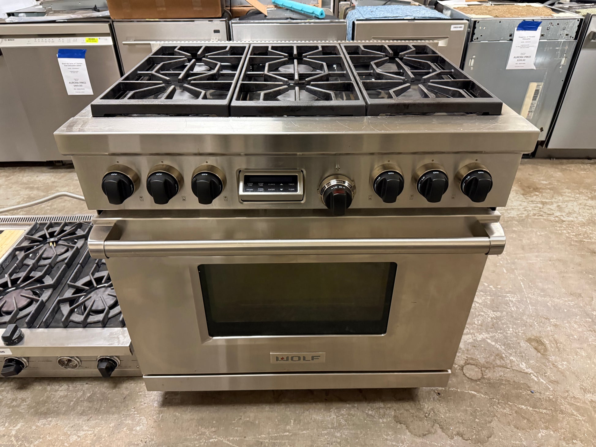 Wolf 36 inch dual fuel range with 6 burners and black knobs