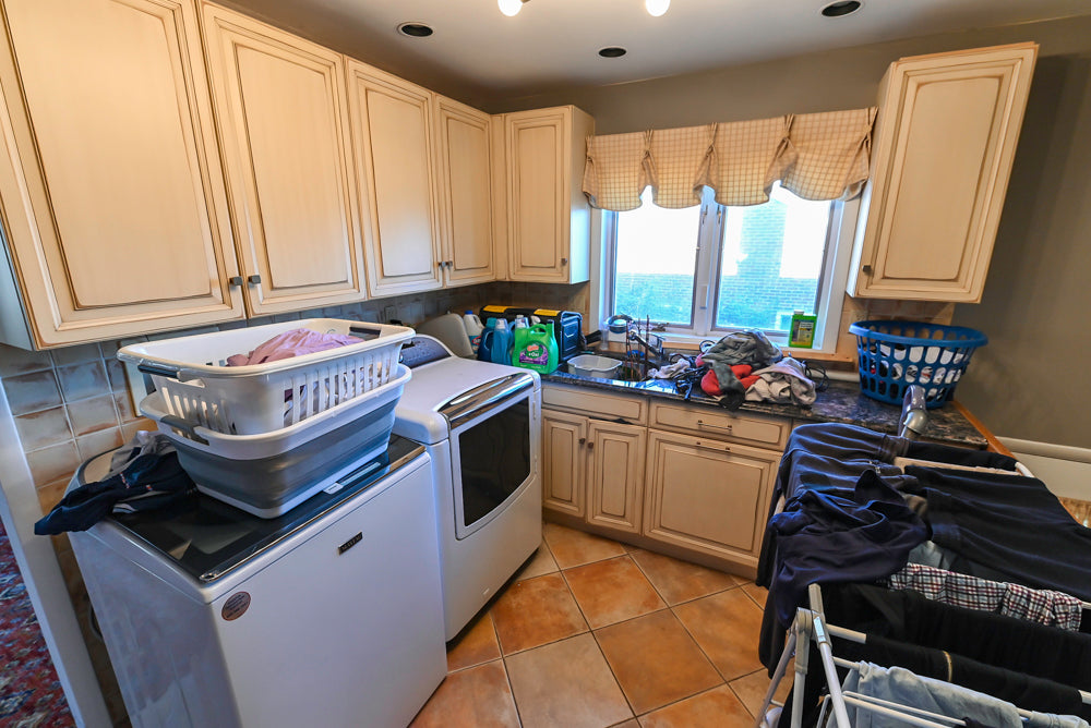 Millbrook Custom Traditional Cream Laundry Room with Sink
