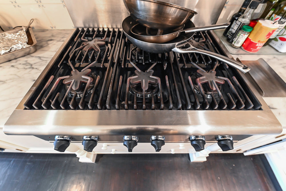 Heritage Traditional Creamy White Kitchen with Island, Marble Countertops and Appliances