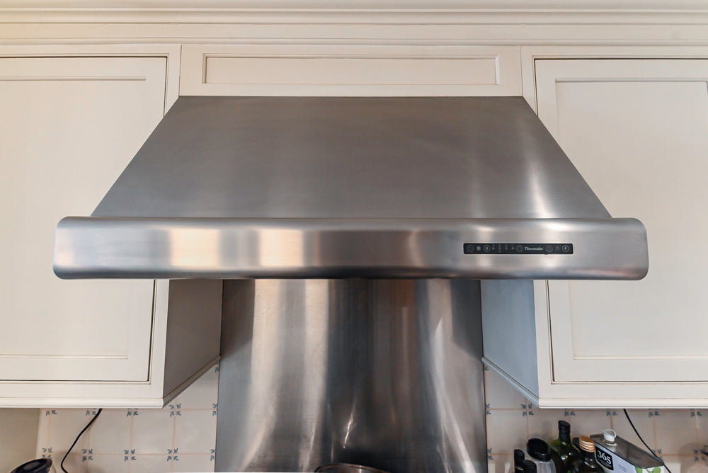 Heritage Traditional Creamy White Kitchen with Island, Marble Countertops and Appliances