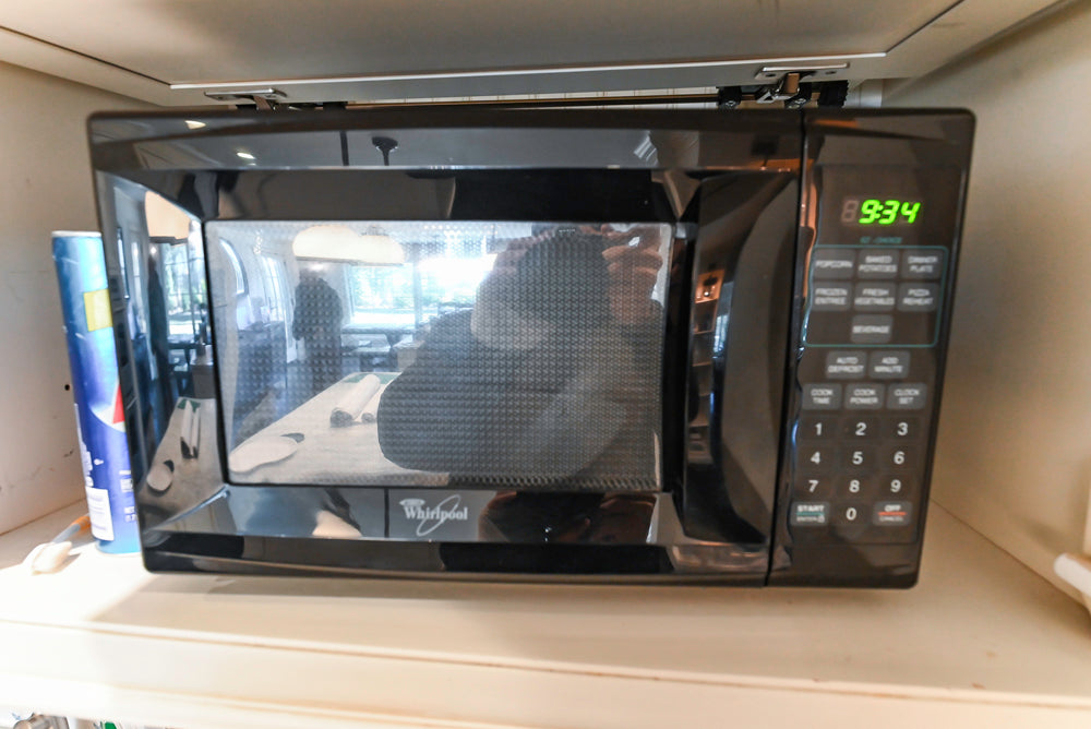 Heritage Traditional Creamy White Kitchen with Island, Marble Countertops and Appliances