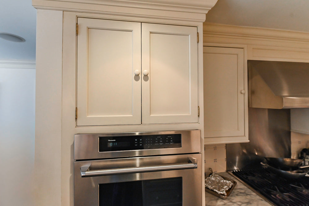 Heritage Traditional Creamy White Kitchen with Island, Marble Countertops and Appliances