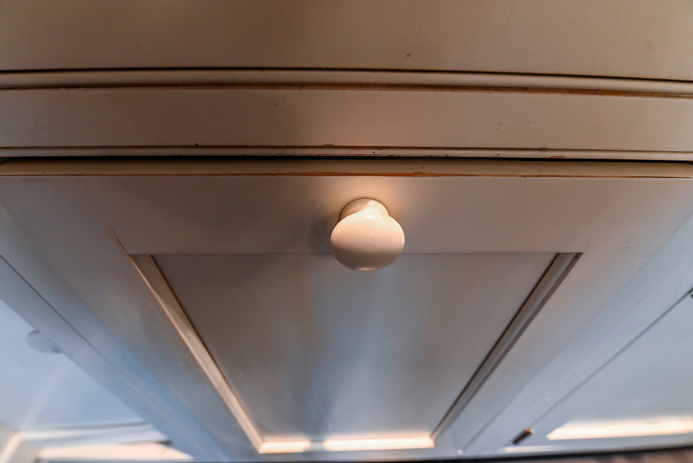 Heritage Traditional Creamy White Kitchen with Island, Marble Countertops and Appliances