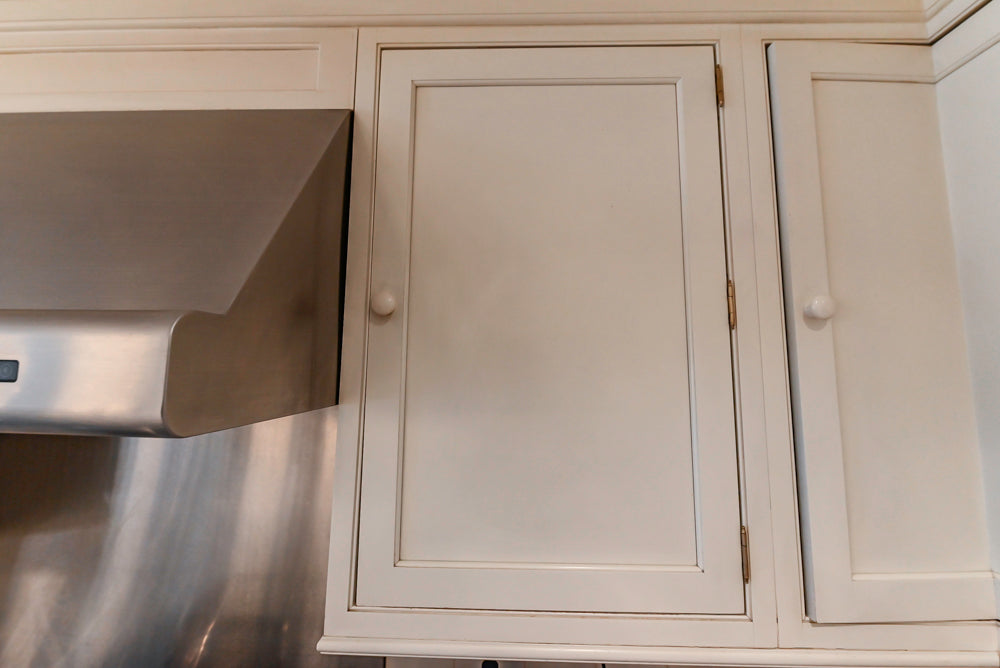 Heritage Traditional Creamy White Kitchen with Island, Marble Countertops and Appliances