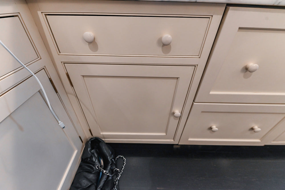 Heritage Traditional Creamy White Kitchen with Island, Marble Countertops and Appliances