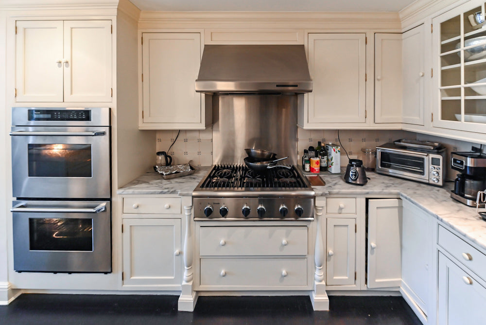 Heritage Traditional Creamy White Kitchen with Island, Marble Countertops and Appliances